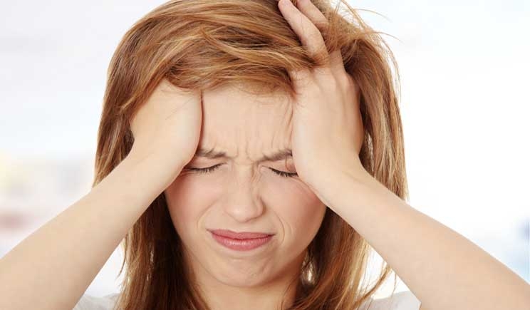 Sconfiggere il mal di testa con la ginnastica posturale