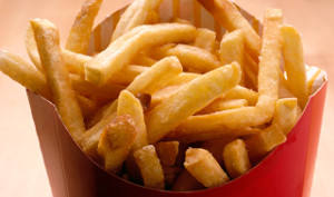 ca. 2002 --- Fast Food French Fries --- Image by Â© Royalty-Free/Corbis